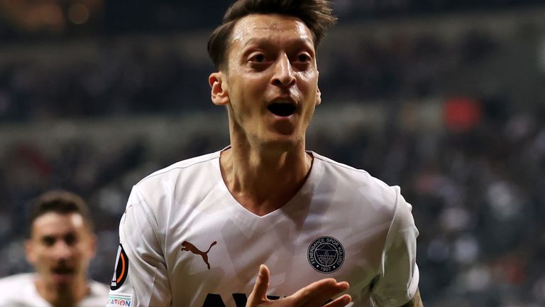 Mesut Ozil of Fenerbahce celebrates after scoring their side&#39;s first goal during the UEFA Europa League group D match between Eintracht Frankfurt and Fenerbahce at Deutsche Bank Park on September 16, 2021 in Frankfurt
