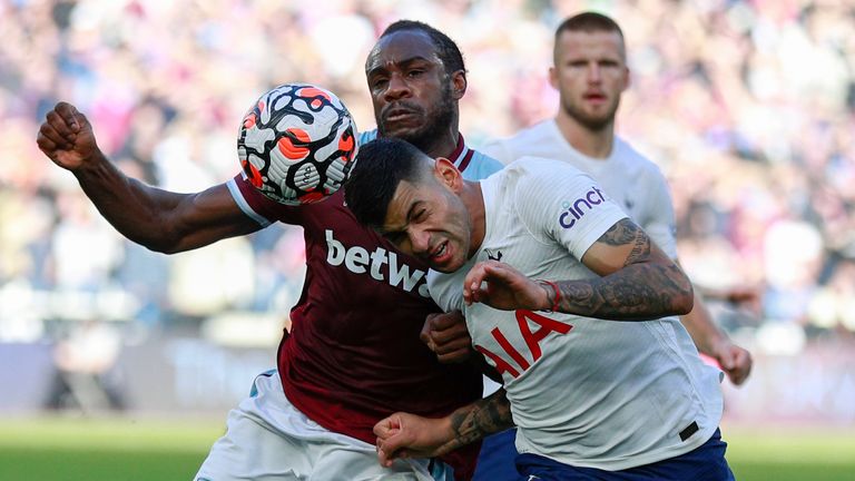 Michail Antonio vies for possession with Romero