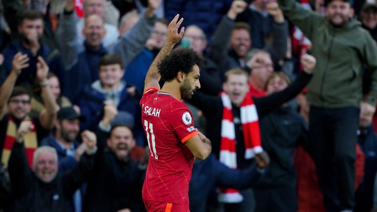 Liverpool's Mohamed Salah celebrates his team's second goal during the Premier League match at Anfield.