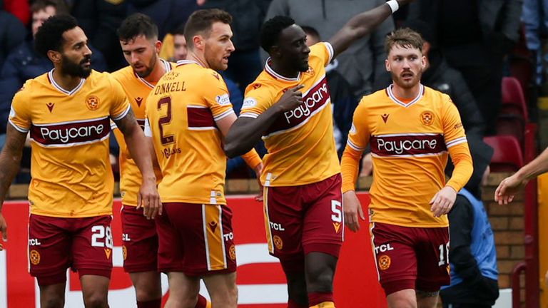 MOTHERWELL, SCOTLAND - OCTOBER 31: Motherwell's Bevis Mugabi (centre) celebrates making it 1-0 during a cinch Premiership match between Motherwell and Rangers at Fir Park, on October 31, 2021, in Motherwell, Scotland. (Photo by Craig Williamson / SNS Group)