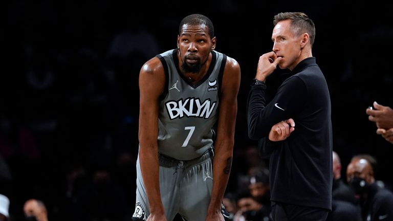 Brooklyn Nets (7) forward Kevin Durant talks with coach Steve Nash during the first half of an NBA basketball game against the Indiana Pacers, Friday, Oct. 29, 2021, in New York.  (AP Photo/Mary Altaffer)