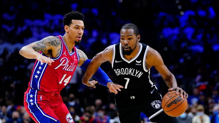 Brooklyn Nets&#39; Kevin Durant, right, dribbles against Philadelphia 76ers&#39; Danny Green during the first half of an NBA basketball game, Friday, Oct. 22, 2021, in Philadelphia. (AP Photo/Matt Slocum)


