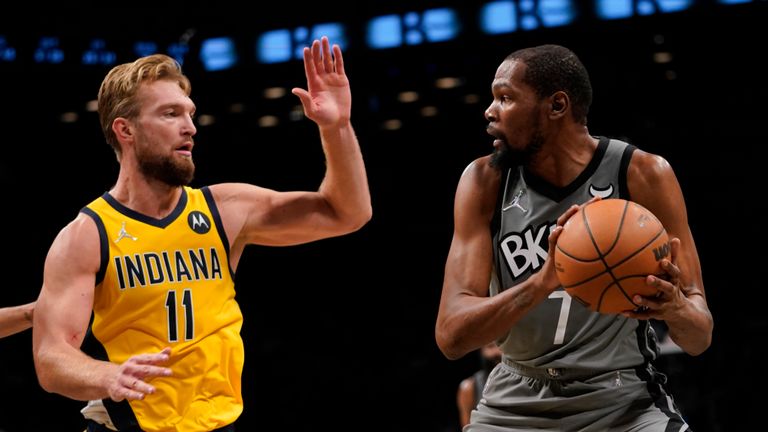 Indiana Pacers forward Domantas Sabonis (11) defends against Brooklyn Nets forward Kevin Durant (7) during the second half of an NBA basketball game, Friday, Oct. 29, 2021, in New York. The Nets won 105-98. (AP Photo/Mary Altaffer)


