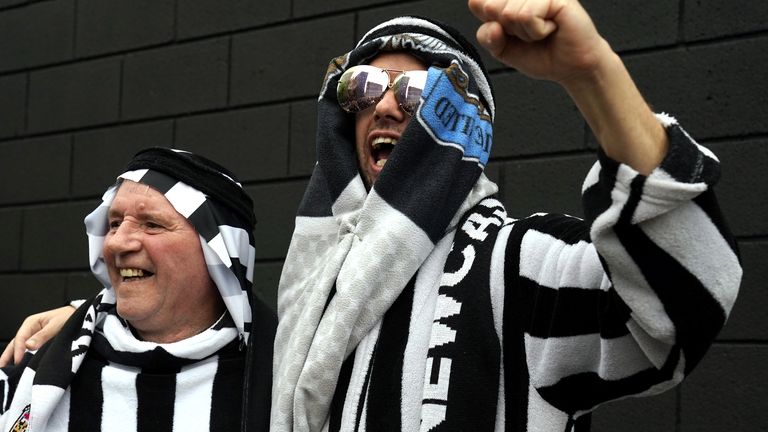 Some Newcastle supporters wore mock headdresses on Sunday after the club's Saudi takeover