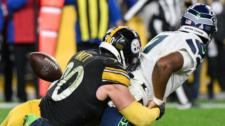 Seattle Seahawks defensive end Darrell Taylor (52) gets set during an NFL  football game against the