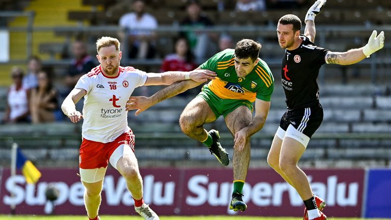 18 July 2021; Caolan McGonigle of Donegal in action against Frank Burns of Tyrone, left, and Tyrone goalkeeper Niall Morgan during the Ulster GAA Football Senior Championship Semi-Final match between Donegal and Tyrone at Brewster Park in Enniskillen, Fermanagh. Photo by Sam Barnes/Sportsfile