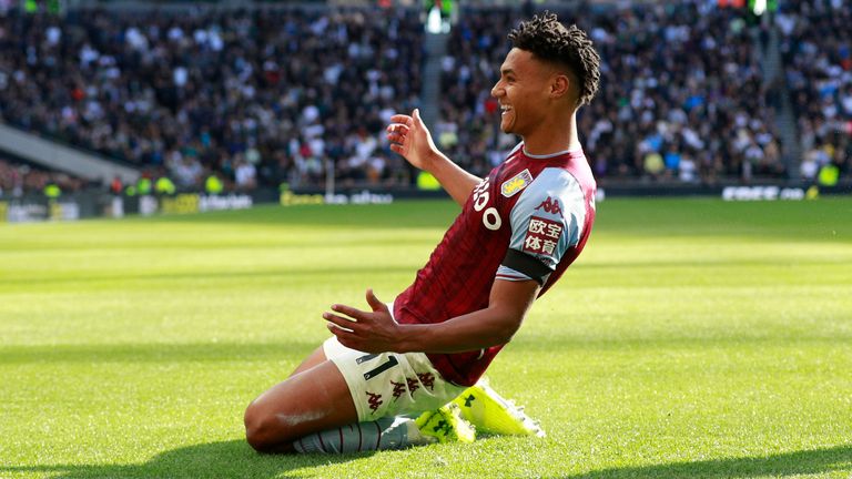 Villa's Ollie Watkins celebrates his second-half equaliser against Spurs (AP)