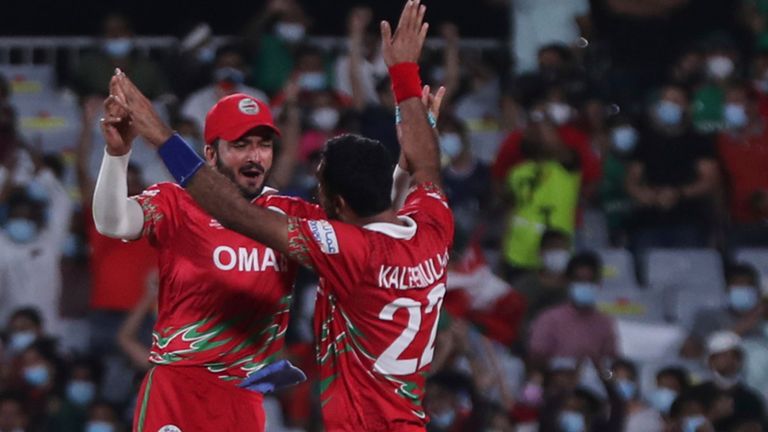 Oman celebrate after taking a wicket against Bangladesh at the T20 World Cup