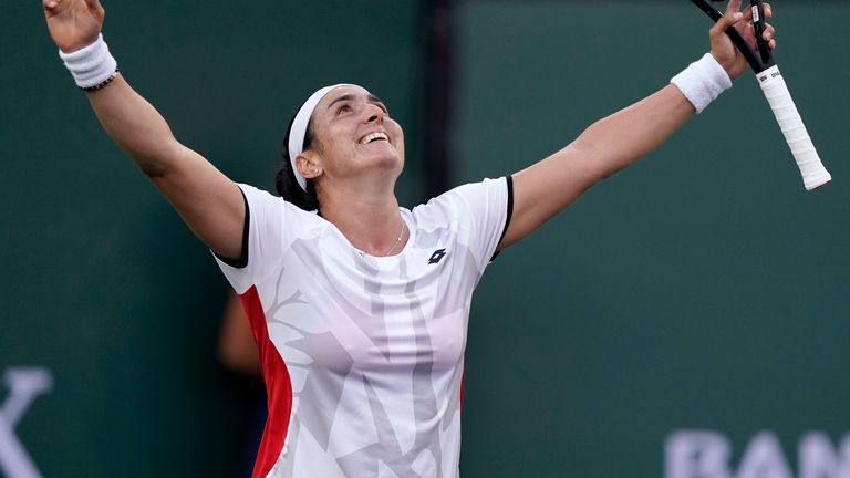 Ons Jabeur, of Tunisia, reacts to her win over Anett Kontaveit, of Estonia, at the BNP Paribas Open tennis tournament Thursday, Oct. 14, 2021, in Indian Wells, Calif. (AP Photo/Mark J. Terrill)