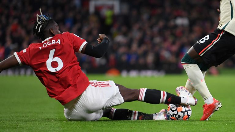 Paul Pogba makes a wild challenge on Naby Keita