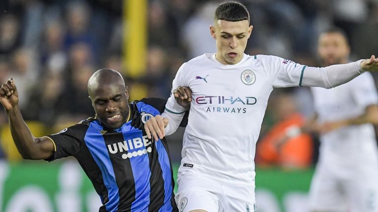 Eder Balanta tangles with Phil Foden