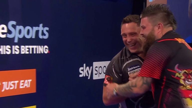 Gerwyn Price defeats Michael Smith in straight set to move into the last 16 of the World Grand Slam.
