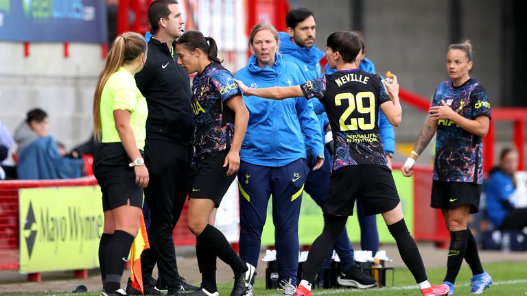 Rachel Williams leaves the pitch after being shown a red card