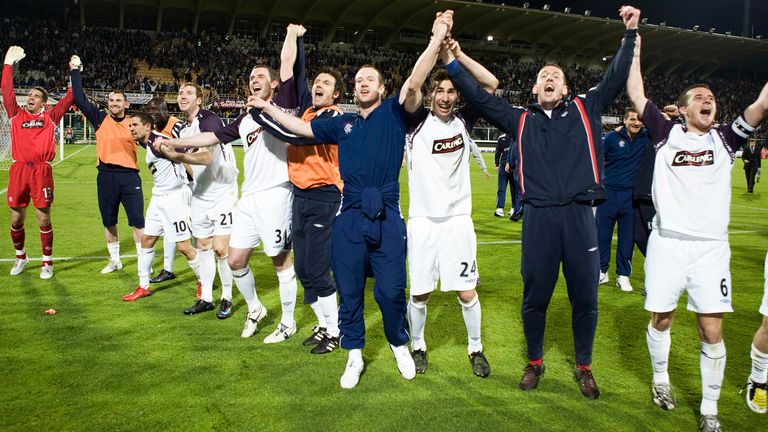 01/05/08 UEFA CUP SEMI-FINAL 2ND LEG.FIORENTINA v RANGERS (0-0 AET, 0-0 AGG, 2-4 pens).FLORENCE - ITALY.Rangers players celebrate with the travelling fans after sealing their place in the Uefa Cup Final, and the club's history