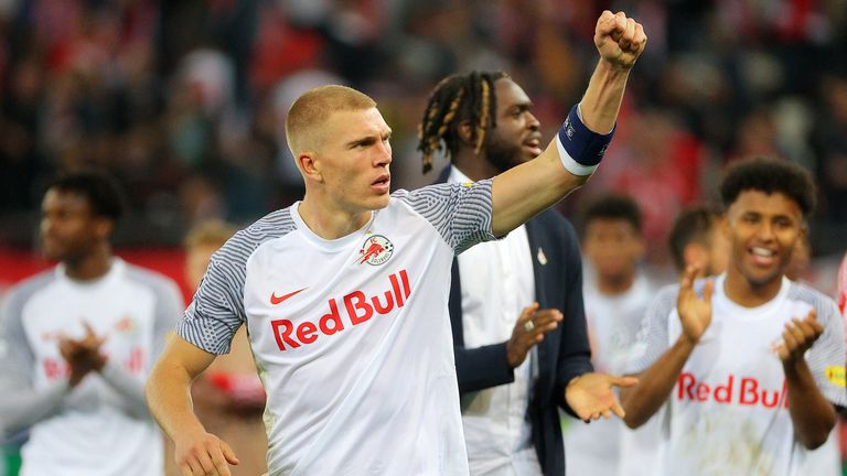 Rasmus Kristensen of RB Salzburg celebrates after winning against Wolfsburg