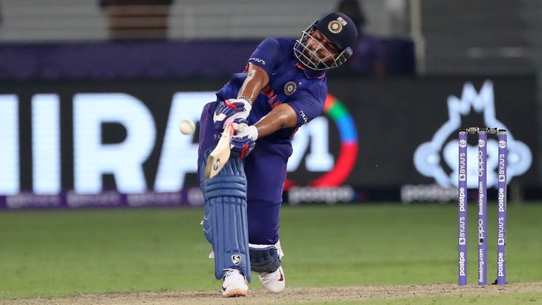 India's Rishabh Pant bats to hit a boundary during the Cricket Twenty20 World Cup match between India and Pakistan in Dubai