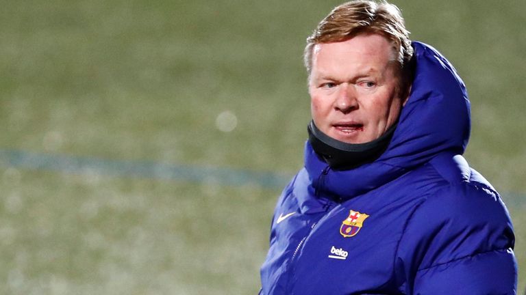 Barcelona&#39;s head coach Ronald Koeman during a Spanish Copa del Rey round of 32 soccer match between Cornella and FC Barcelona at the Nou Municipal stadium in Cornella, Spain, Thursday, Jan. 21, 2021. (AP Photo/Joan Monfort)