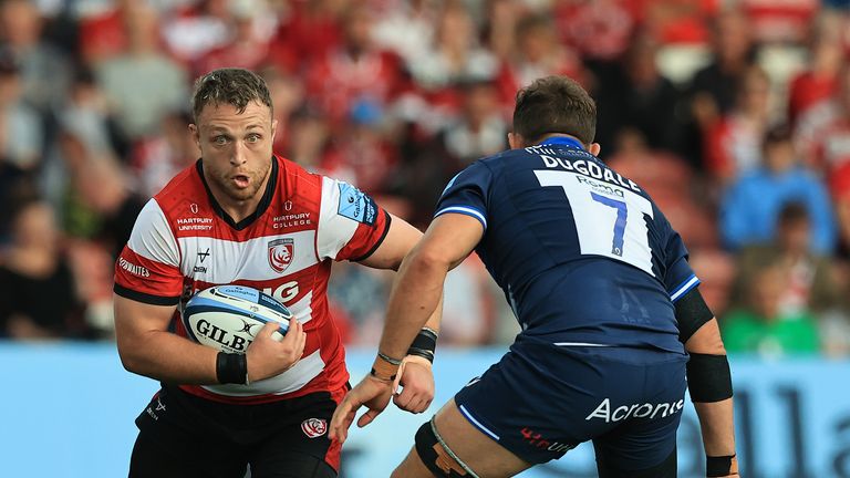 Gloucester's Ruan Ackermann takes on Sam Dugdale