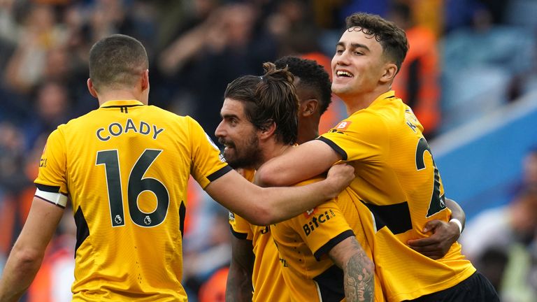 Ruben Neves is mobbed following his late strike