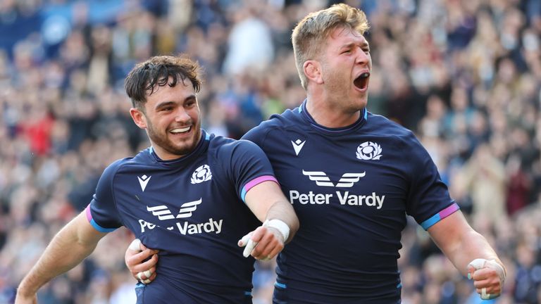 Rufus McLean celebrates his 1st try with Jamie Hodgson