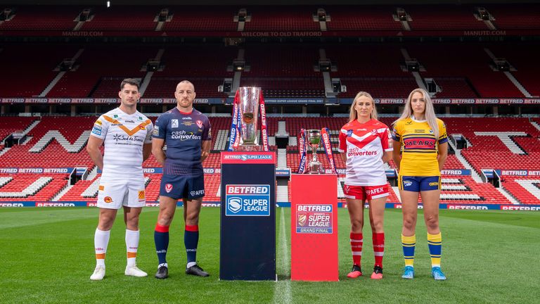 Picture by Allan McKenzie/SWpix.com - 08/10/2021 - Rugby League - Betfred Super League - Betfred Super League Grand Final Preview - Old Trafford, Manchester, England - Betfred Super League Grand Finalists - Catalan Dragon's Benjamin Garcia & St Helens's James Roby with St Helens's Jodie Cunningham & Leeds's Caitlin Beevers.