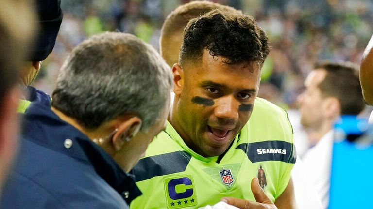 Seattle Seahawks coach Pete Carroll says that quarterback Russell Wilson picked up a 'badly sprained finger' and that further tests would be coming.