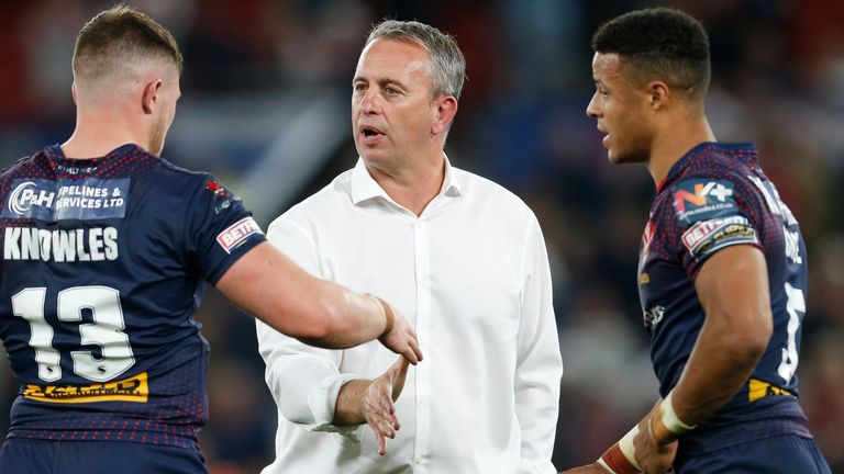 Picture by Ed Sykes/SWpix.com - 09/10/2021 - Rugby League - Betfred Super League Grand Final - Catalans Dragons v St Helens - Old Trafford, Manchester, England - Catalans Dragons head coach Steve McNamara with St Helens' Morgan Knowles and Regan Grace after the game