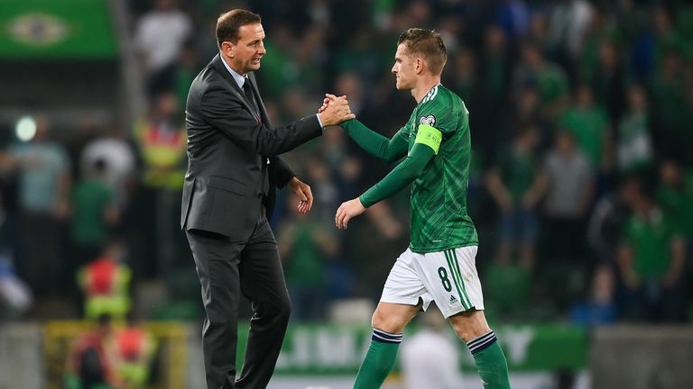 Northern Ireland manager Ian Baraclough, left, and Steven Davis of Northern Ireland after their side's draw in the FIFA World Cup 2022 qualifying group C match between Northern Ireland and Switzerland at National Football Stadium at Windsor Park in Belfast.