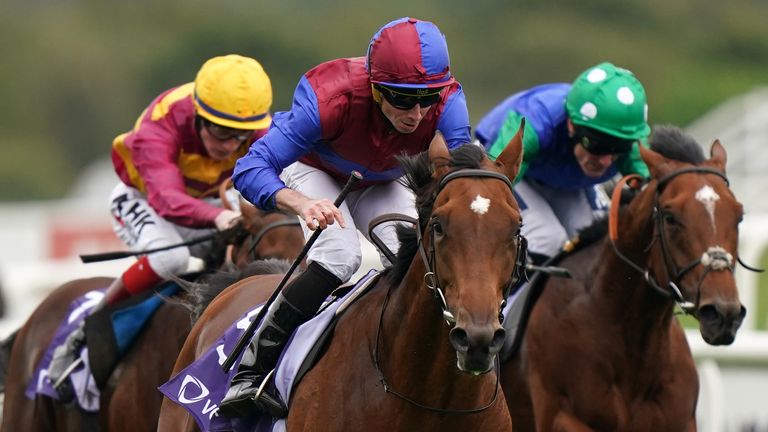 Luxembourg and Ryan Moore on their way to victory in the Vertem Futurity at Doncaster