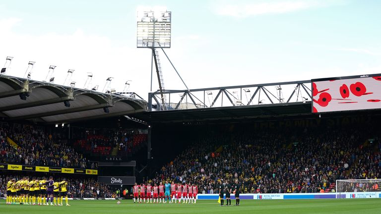 The players observe a a minute's silence ahead of Remembrance Day 