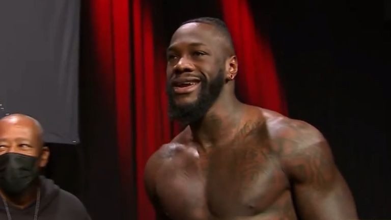 Deontay Wilder taunts Tyson Fury at the weigh-in for their third fight.