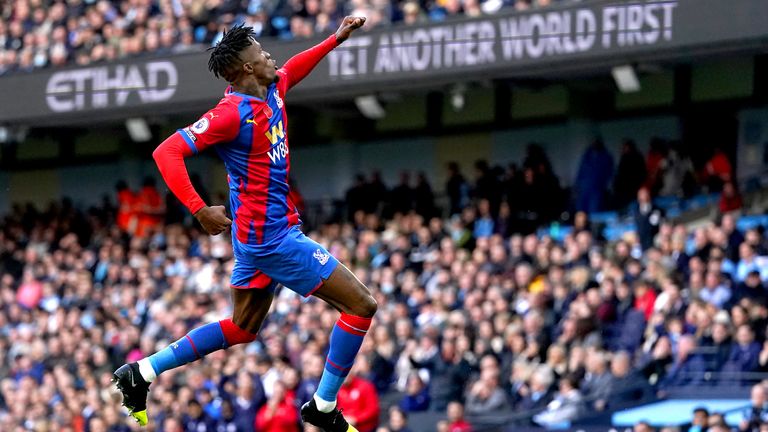 Crystal Palace's Wilfried Zaha celebrates his early goal at the Etihad Stadium