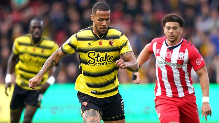Watford's William Troost-Ekong (left) and Southampton's Che Adams battle for the ball 