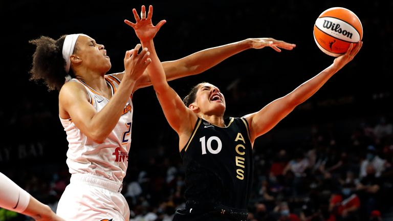 Las Vegas Aces guard Kelsey Plum (10) lays up the ball as Phoenix Mercury forward Brianna Turner (21) defends during the second half of Game 1 in the semifinals of the WNBA playoffs Tuesday, Sept. 28, 2021, in Las Vegas. The Aces beat the Mercury 96-90. 
