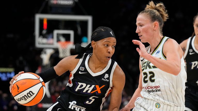Phoenix Mercury guard Shey Peddy (5) drives on Chicago Sky guard Courtney Vandersloot during the first half of Game 2 of basketball&#39;s WNBA Finals, Wednesday, Oct. 13, 2021, in Phoenix. (AP Photo/Rick Scuteri)



