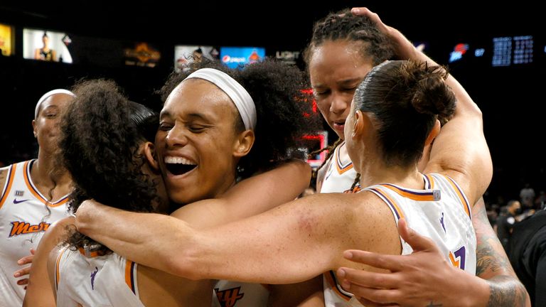 The Phoenix Mercury celebrate after defeating the Las Vegas Aces 87-84 in Game Five of the 2021 WNBA Playoffs semi-finals to win the series