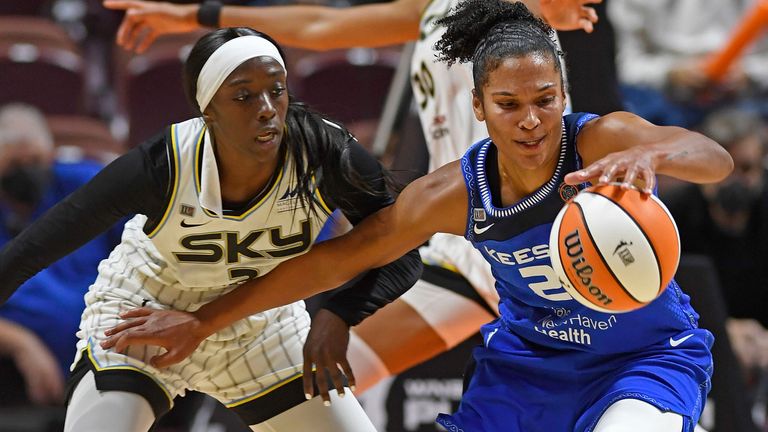 Connecticut Sun forward Alyssa Thomas, right, fends off Chicago Sky defender Kahleah Copper during a WNBA playoff basketball game Thursday, Sept. 30, 2021 at Mohegan Sun Arena in Uncasville, Conn.