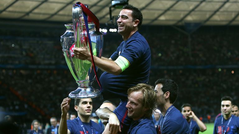 Xavi a remporté la Ligue des champions à quatre reprises avec Barcelone (AP)