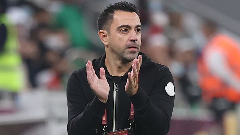 Xavi encourages his players during the Amir Cup final football match between Al-Sadd and Al-Rayyan at the Al-Thumama Stadium in the capital Doha on October 22, 2021