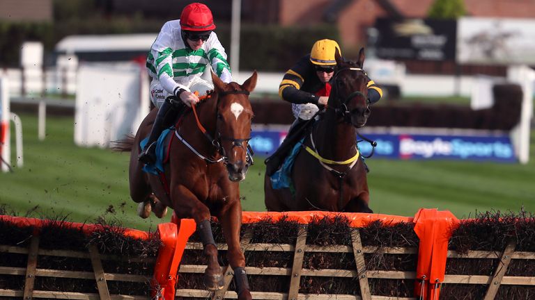 Zanahiyr pulling away to win the WKD Hurdle