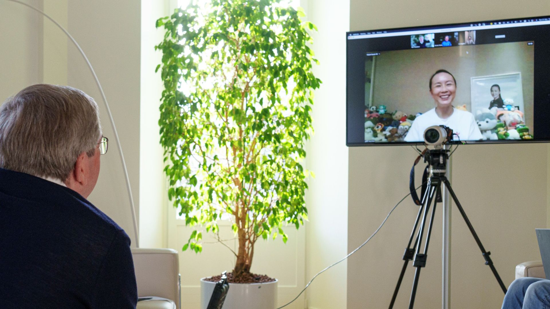 Peng says she is 'safe and well' in IOC video call