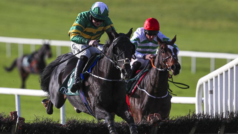Darasso ridden by Luke Dempsey (left) jumps the last in the Lismullen Hurdle