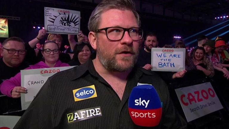 James Wade overcame a number of obstacles to defeat Rob Cross 16-14 and reach the Grand Slam of Darts semi-final