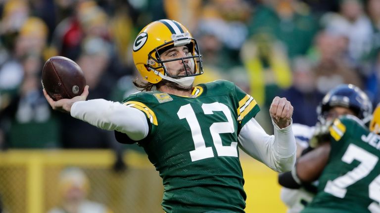 Green Bay Packers&#39; Aaron Rodgers thorws during the first half of an NFL football game against the Seattle Seahawks 