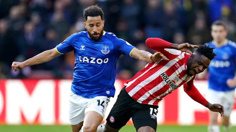 Andros Townsend and Frank Onyeka battle for possession