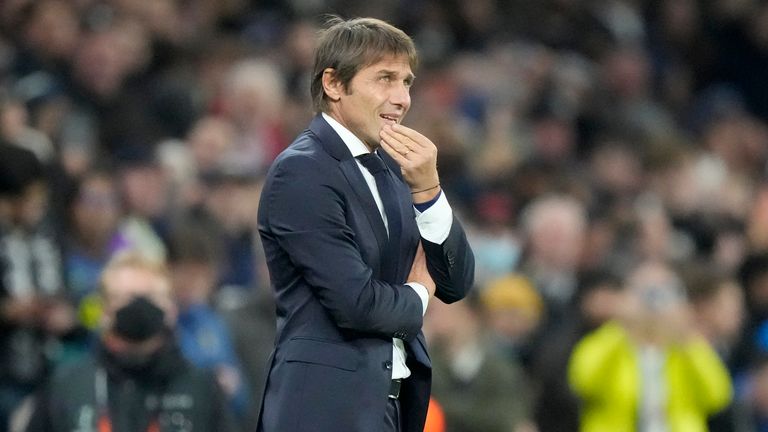 Antonio Conte stands on the touchline
