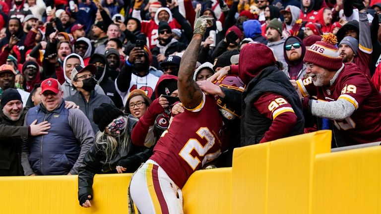 Washington Football Team running back Antonio Gibson (24) celebrates after his touchdown during the second half of an NFL football game against the Tampa Bay Buccaneers