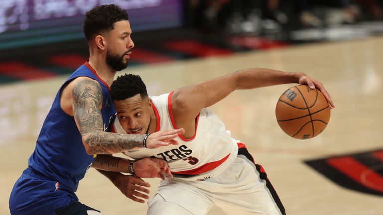 CJ McCollum top-scored with 32 points as Portland thrashed Denver in Tuesday&#39;s NBA action.