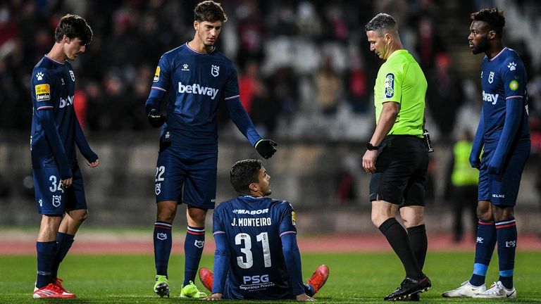 An injury to Joao Monteiro, a goalkeeper playing outfield, reduced Belenenses to six men against Benfica (Getty)