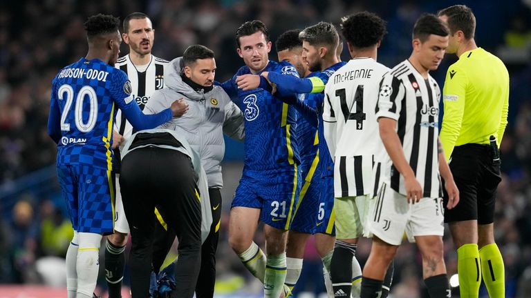 Chelsea's Ben Chilwell receives treatment during the game against Juventus